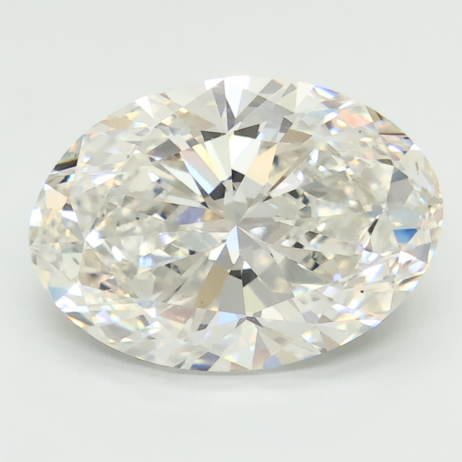 5.01-carat oval diamond with G color, null cut, and VVS2 clarity.